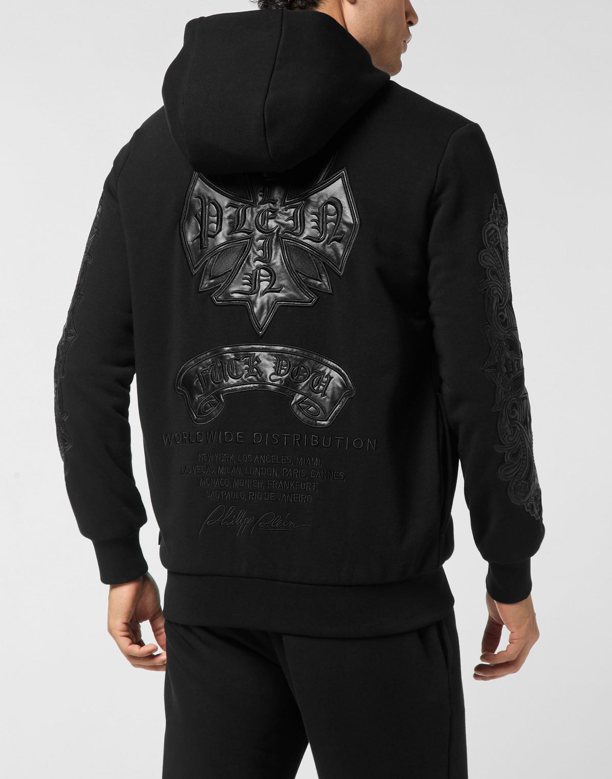 Philipp Plein Chrome Crest 皮革緞帶蝴蝶結裝飾與拉鍊細節展示