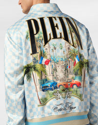 Philipp Plein 胸前 PLEIN 品牌刺繡與金屬釦件細節特寫